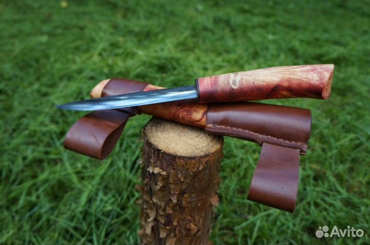 Нож с линзой