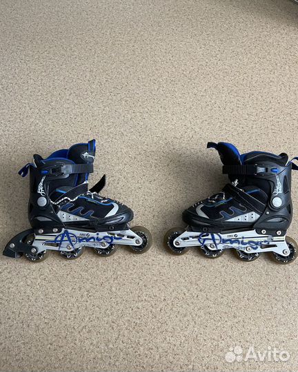 Роликовые коньки