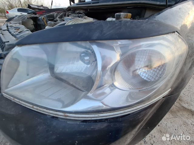 Стекло фары левое Chevrolet aveo t250