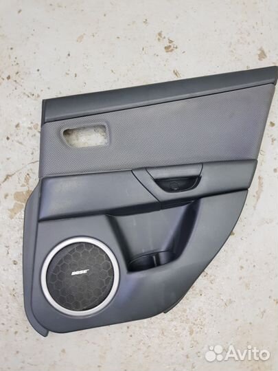 Обшивка двери Мазда 3