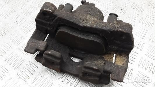 Суппорт тормозной передний левый renault laguna 3