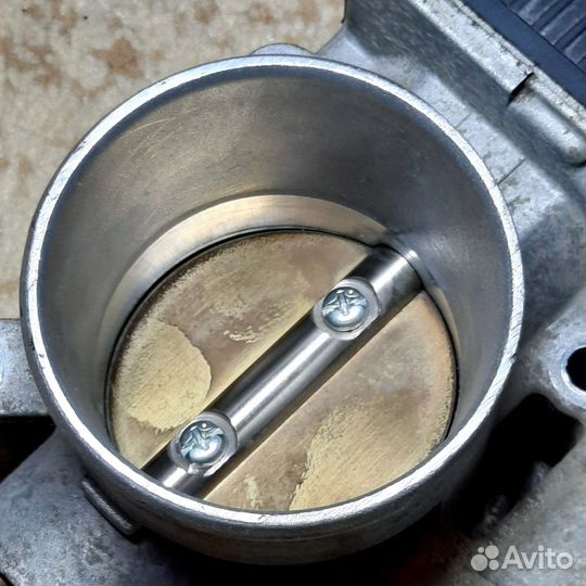 Дроссельная заслонка Nissan Almera b10