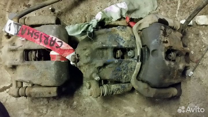 Суппорт тормозной Mitsubishi Carisma