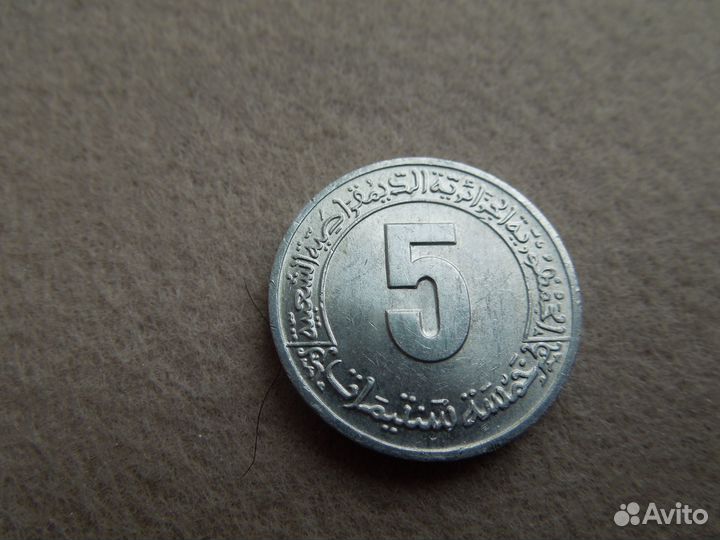 Юбилейные монеты Алжира и Индонезии