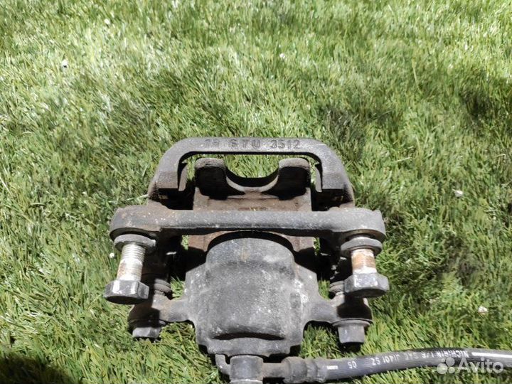 Суппорт тормозной задний правый Nissan X-Trail T30