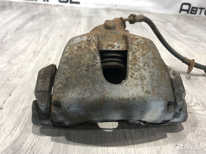 Суппорт тормозной передний левый Ford Focus 3 pnda