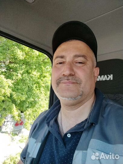 Водитель самосвала