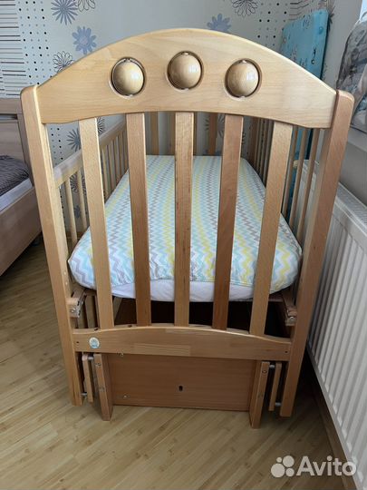 Детская кроватка с маятником Лель