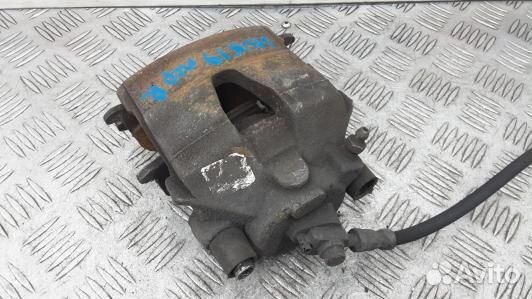 Суппорт тормозной передний правый skoda octavia A7 (HUK19N701)