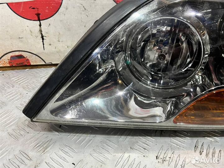 Фара левая Kia Sorento 02-10