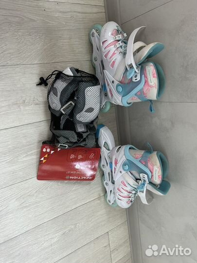 Роликовые коньки