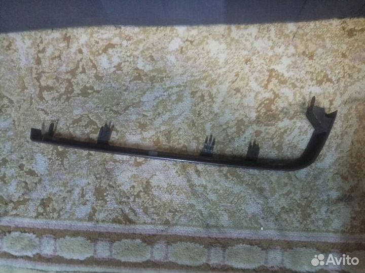 Накладка под фару ресничка левая Volvo 940