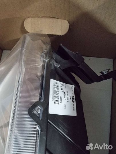 Фара левая Fiat Linea