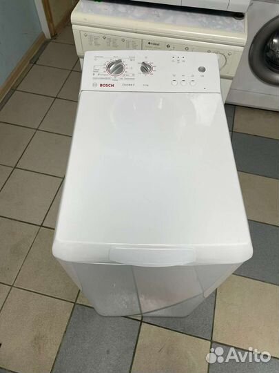 Стиральная машина с вертикальной загрузкой