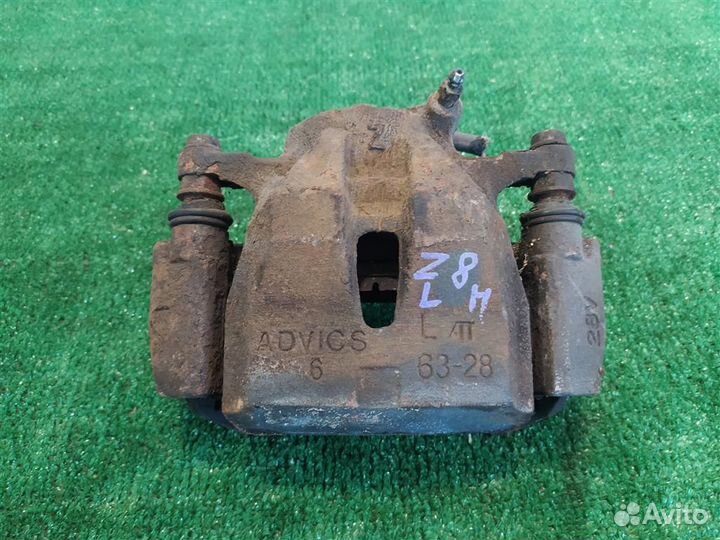 Суппорт тормозной передний левый Toyota RAV4 A30