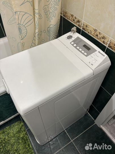 Стиральная машина с вертикальной загрузкой