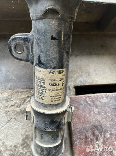 Стойка амортизатора kia sportage 2009