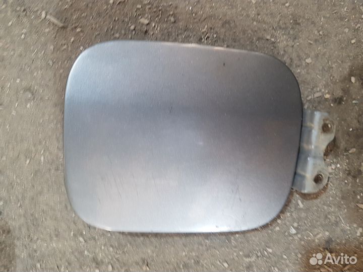 Мицубиси Лансер Цедия лючок бензобака