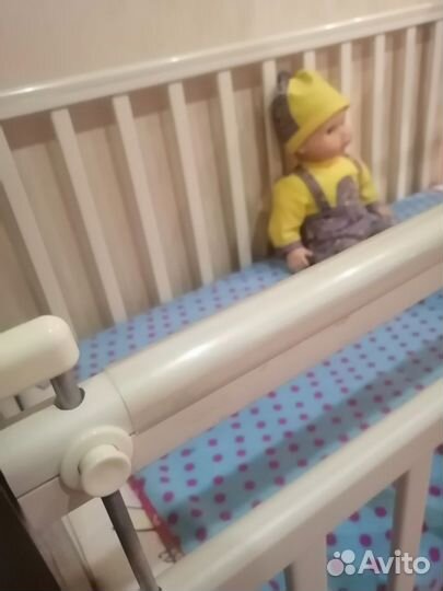 Кровать детская с маятниковым механизмом 