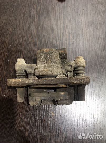 Суппорт задний левый Mitsubishi Lancer 9