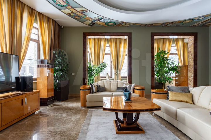 Коттедж 540 м² на участке 12 сот.