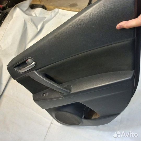 Обшивка двери задняя правая Mazda 3 BL
