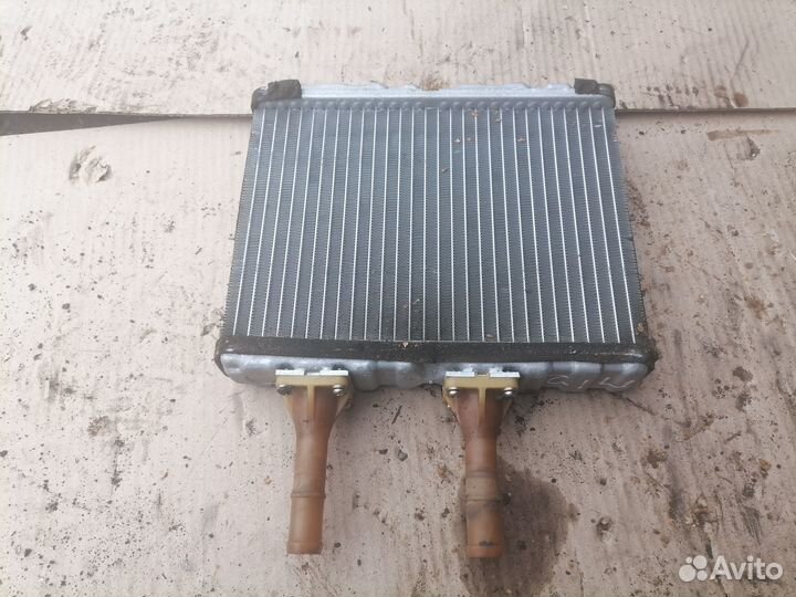 Радиатор печки Ниссан Примера П12