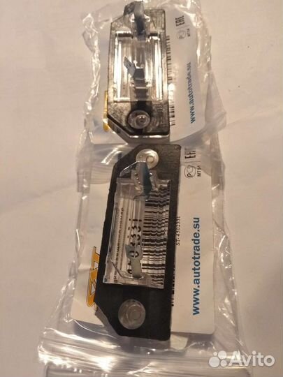 Фонарь освещения заднего номера на Форд фокус 2