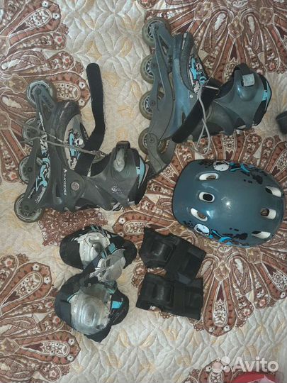 Роликовые коньки