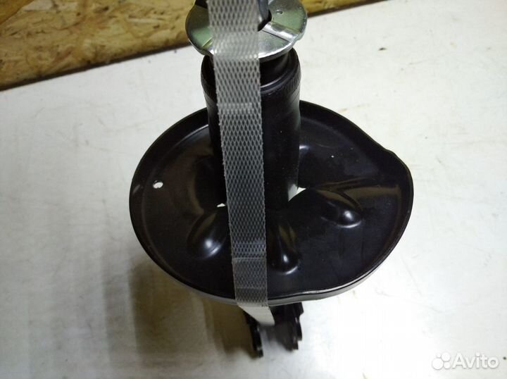 Амортизатор задний левый для Mazda 323F 1998-2003