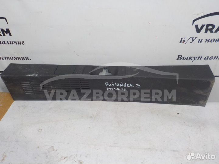 Обшивка багажника задняя (задней панели) Mitsubish