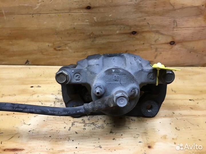 Суппорт лев. перед. toyota funcargo