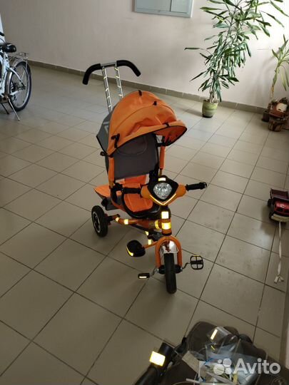 Трехколесный велосипед с родительской ручкой