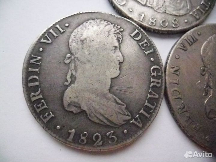 З монеты Испанские Колонии-8реалов.серебро