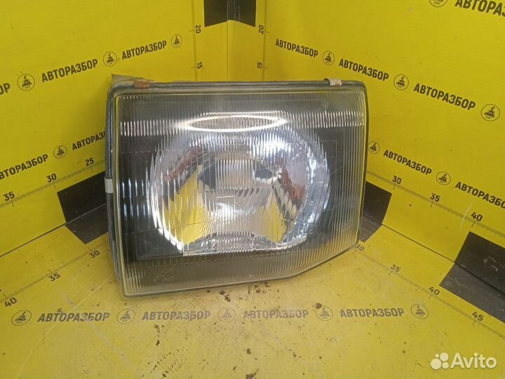 Фара левая Mitsubishi pajero 2.8