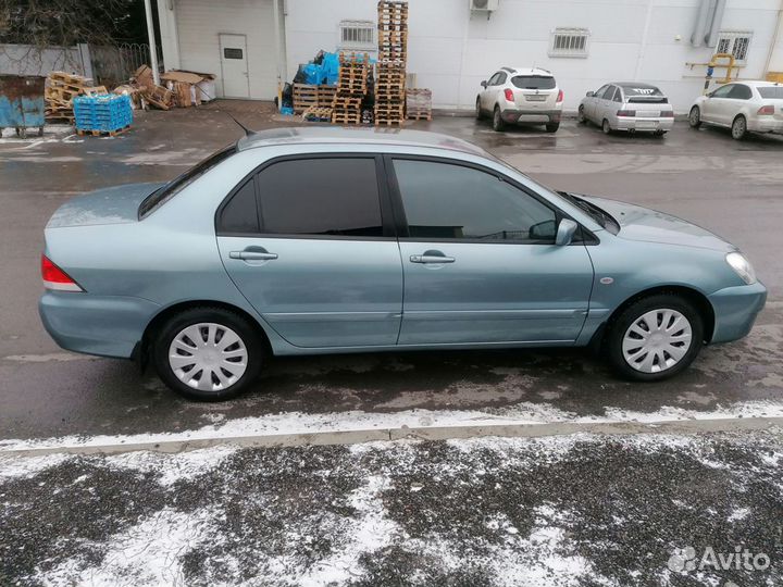 Mitsubishi Lancer 1.6 МТ, 2006, 140 000 км