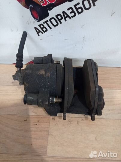 Суппорт тормозной передний правый Volkswagen Polo