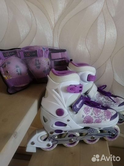 Роликовые коньки