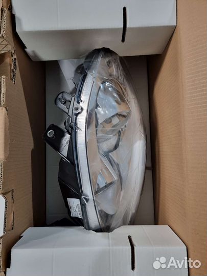 Фара левая Fiat Linea