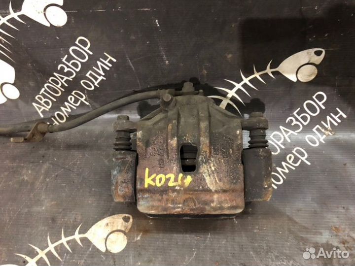 Суппорт тормозной передний правый Kia Soul 1.6