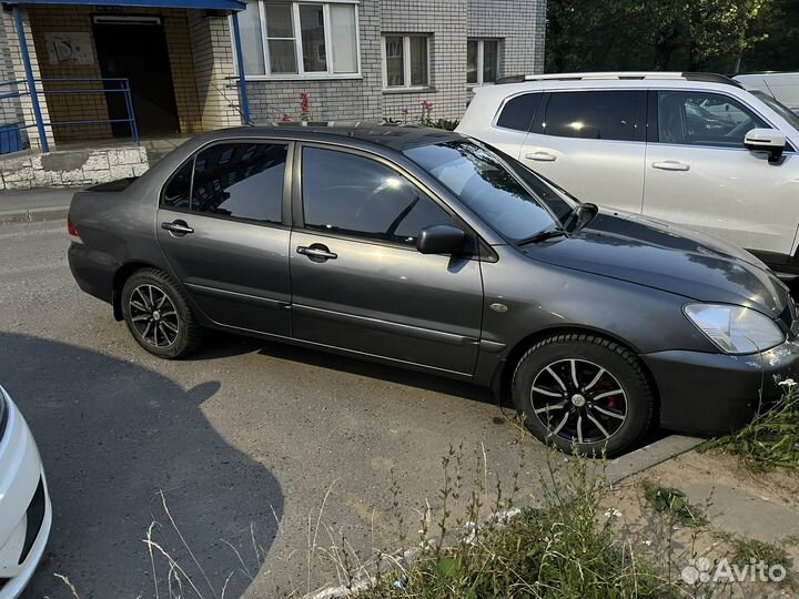 Mitsubishi Lancer 1.6 МТ, 2006, 200 000 км