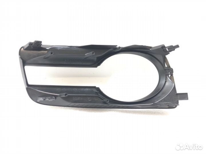 Накладка противотуманной фары передняя левая Mazda