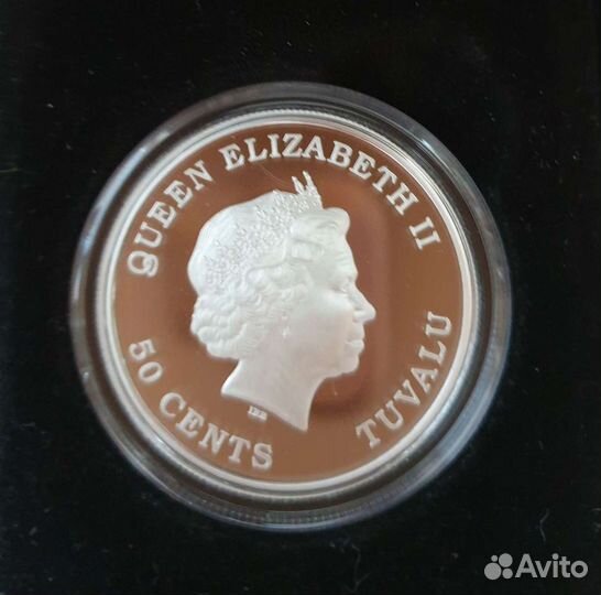 Монета серебряная 