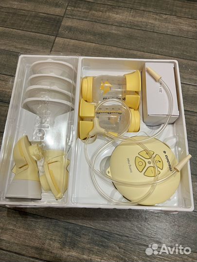 Молокоотсос medela