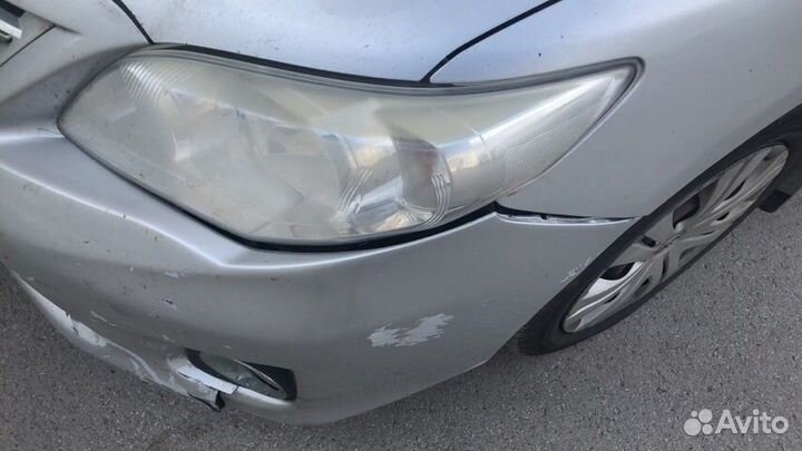 Бампер тойота королла 2011