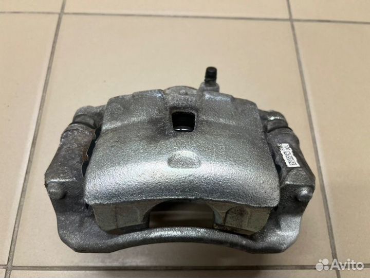 Суппорт передний левый Kia Cerato 28000 км 1.6