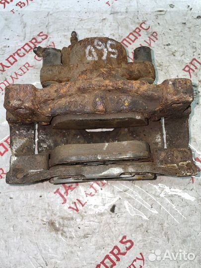 Суппорт тормозной передний левый Volvo V70