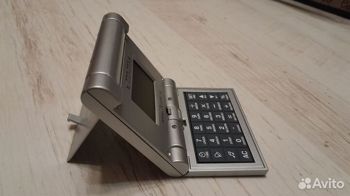 Калькулятор с часами Седьмой континент