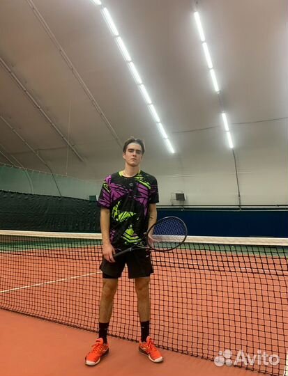 Тренер по большому теннису