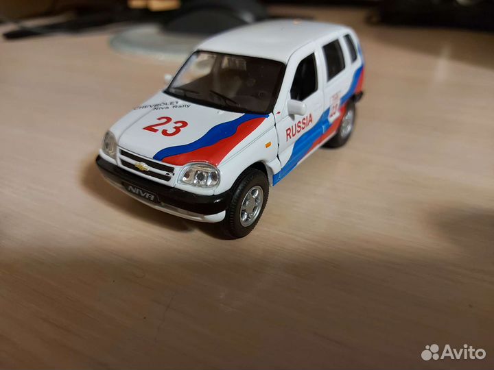 Модель Welly Chevrolet Niva 1:34-1:39